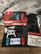 Nintendo Switch V2 64gb +pad +21 gry stan idealny