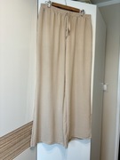 Spodnie damskie z szeroką nogawką kolor beżowy XL