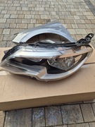 Peugeot 301 reflektor lewy 9817298380