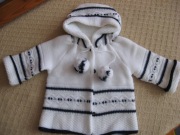 Cieplutki sweterek na 80 cm.