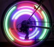 LAMKA ROWEROWA LED NA SZPRYCHY KOŁO NAKŁADKA ŚWIECĄCA