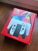 Nintendo Switch OLED (4 - joy-con) + etui Zelda (polska dystrybucja)