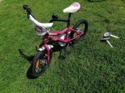 Rower dla dziewczynki z dodatkowymi kółkami. Koła 16 cali 