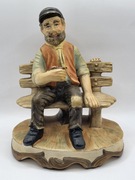Ceramiczna figurka Żebraka z fajką