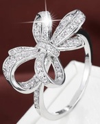 Pierścionek r. 10 srebrny z cyrkoniami kokardka + pudełko