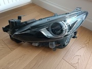 Mazda 3 BM 2013-16 reflektor lampa lewy przód W1707L