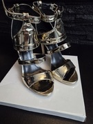 Złote sandałki na szpilce