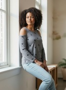 Bluzka damska z wycięciami - czarny wzór L/XL