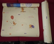 Rolka tapety z Kubusiem Puchatkiem. Wzór sprzed 20 lat.