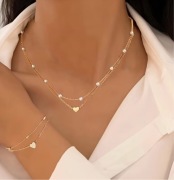 Naszyjnik typu celebrytka z zawieszką serce i perełkami + bransoletka