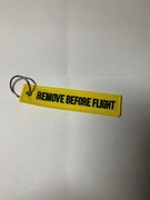 Haft "remove before flight" w kolorze zółtym