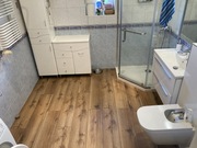 Układanie paneli podłogowych, malowanie 