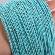 Turkus kulka gładka 2,6 mm., sznurek 18.5 cm.