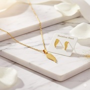 Nowy komplet pozłacany stal nierdzewna kolczyki + łańcuszek celebrytka