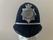 Hełm bobbiego brytyjskiej policji Dorset Police