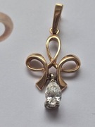 Luksusowa zawieszka z diamentem. Złota zawieszka, wisior