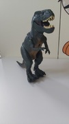 Dinozaur duży. Chodzi i ryczy 