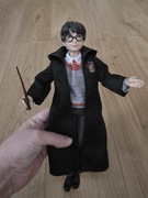 Lalka Harry Potter w sztach i z różdżką stan idealny