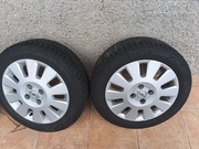 Oryginalne alu felgi Opla z oponami wielosezonowymi 