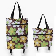 Torba na kółkach 2w1 na zakupy składana kolorowa w kwiaty na ramię