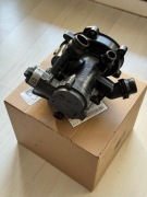 Oryginalny regulator płynu chłodzącego do Skoda Superb III - 06L121111L