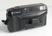 Ładny aparat analogowy Canon Prima Junior 35 mm 1:3.8 z usterką