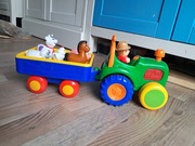 Zabawka Dumel - Farmer z traktorem i przyczepą.