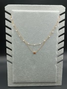 Dwuwarstwowy naszyjnik z serduszkiem i perełkami