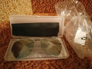 specjalistycznenakładki polaryzacyjnemontowane na okulary korekcyjne. 