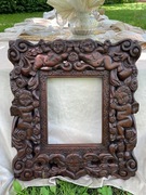 Rama rzeźbiona. Lustro