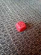 Czerwona kostka do gry..