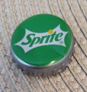 Kapsel Sprite butelkowane