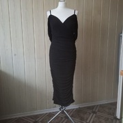 Czarna powlekana siateczką Sukienka marki Silquee