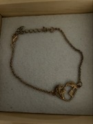 BRANSOLETKA SHEIN z sercem kontury świata i kontynentów kolor złota 23 cm