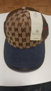 Czapki z daszkiem Gucci. 