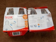 Nowe butelki NUK 0-6 m - 4 szt + laktator NUK