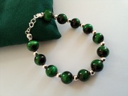 Srebrna bransoletka z zielonym tygrysim okiem. Srebro 925.