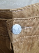 Damskie spodnie jeansowe marki Weekday 