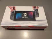Nintendo Switch + 2x Joy-Con (neon) + 1-2-Switch + etui + dodatki