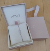 Srebrna bransoletka Apart z symbolem nieskończoności i cyrkoniami. Nowa