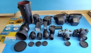 Aparaty fotograficzne Praktica, obiektywy, lampy, lornetki