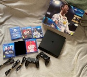 PS4 Slim 1TB + 2 pady + Gry