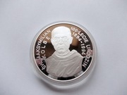 300000 zł 1994  Św. M. Kolbe, uncja 31,1 g. Ag 999