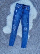 Spodnie missguided z wysokim stanem i dziurami 