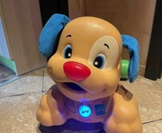 Pies piesek jeżdżący Fisher Price muzyka dźwięki jeździk