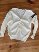 Nowy śmietankowy sweter damski ze ściągaczem uni