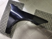 Błotnik prawy przód czarny W118 CLA Lakier kod 191