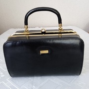 Suzy Smith elegancki czarny kuferek stan bardzo dobry 