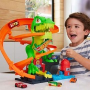 Hot Wheels City Zakręcony tor Remiza T-rexa Tor z dinozaurem