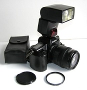 Canon EOS 1000 + EF 35-105 1:3.5-4.5 + lampa Speedlite 380EX + bateria